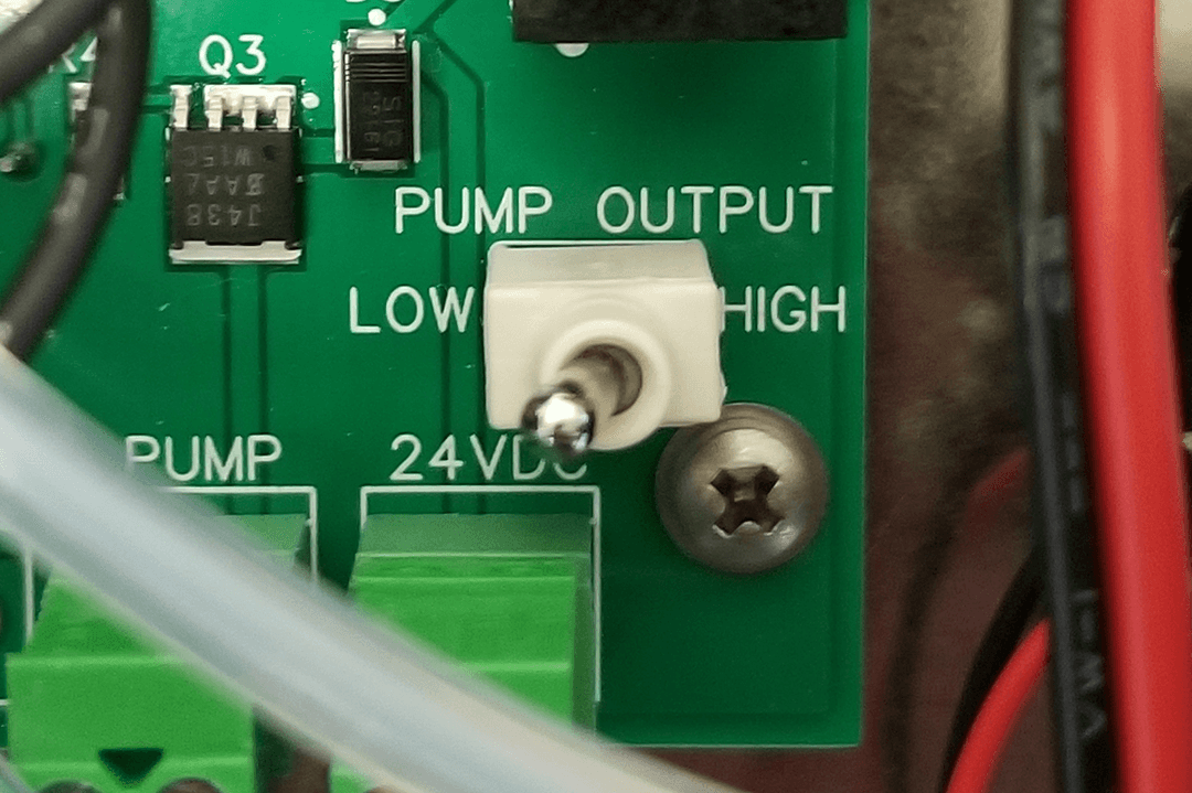 Switch flipped to the left indicating low pump output